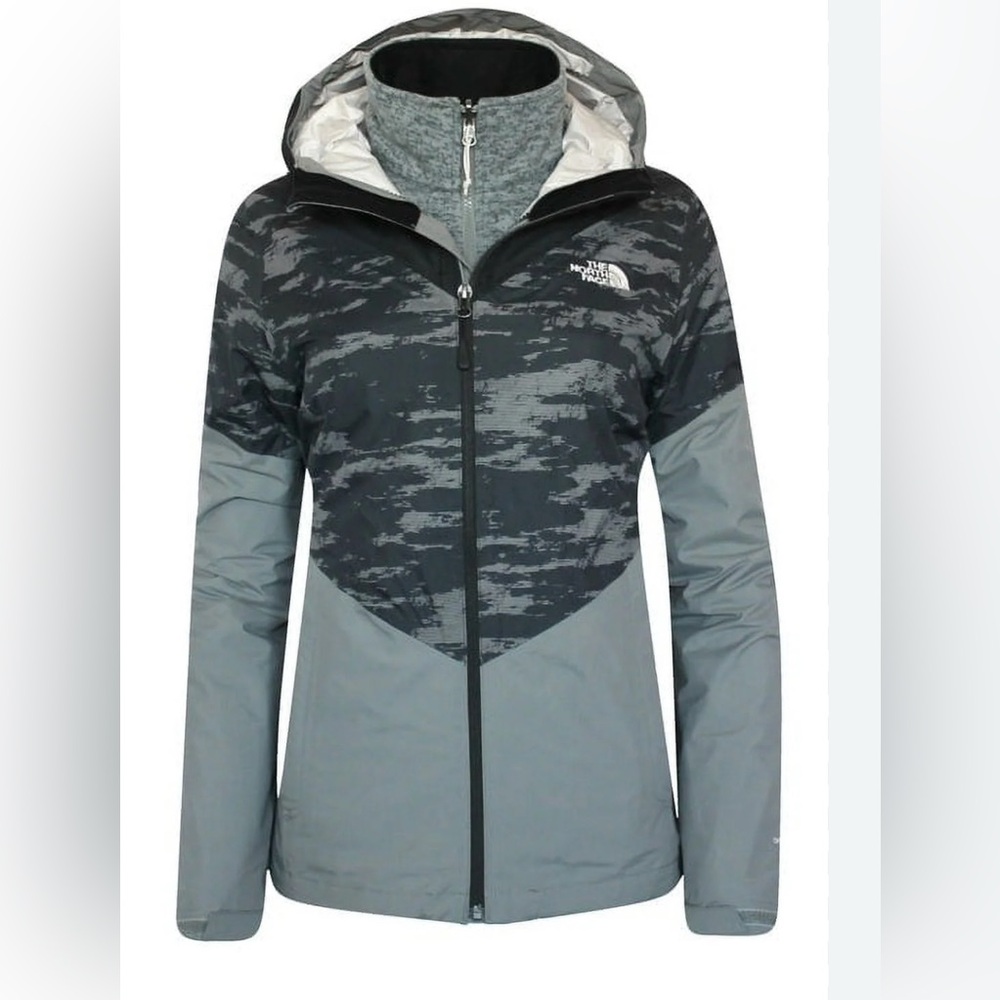 The North Face wind breaker jacket.‎ Light purple. Women size XL